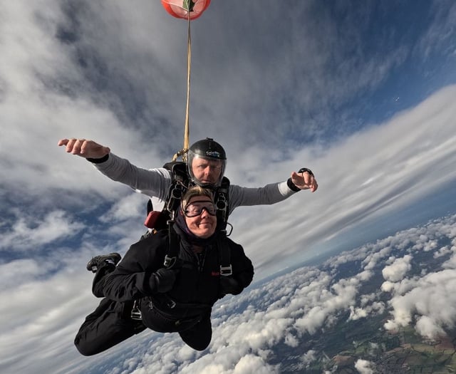 Great leap forward as volunteers skydive for canine charity