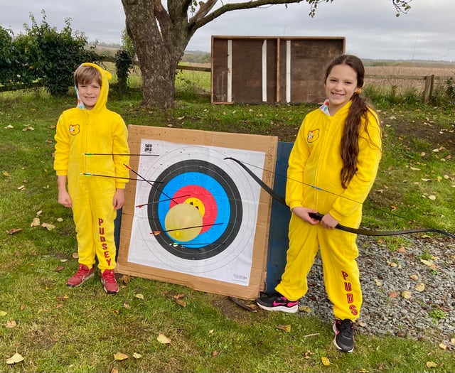Siblings smash archery challenge to raise Children in Need funds