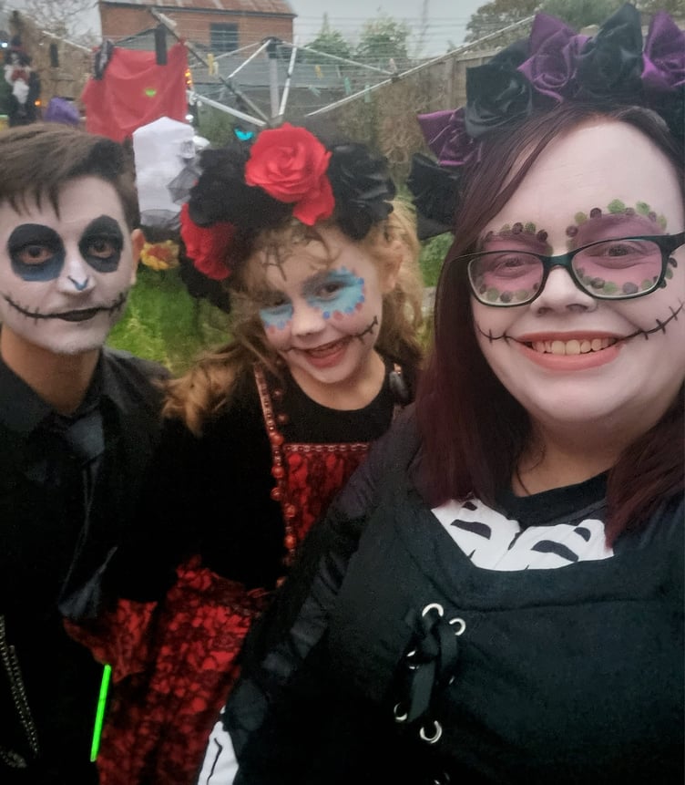 Megan, David and Evelyn, Vicky's Hallowe'en Garden, Victoria Road, Alton, October 31st 2024.