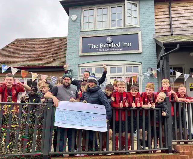 Cheers to village pub for football club donation