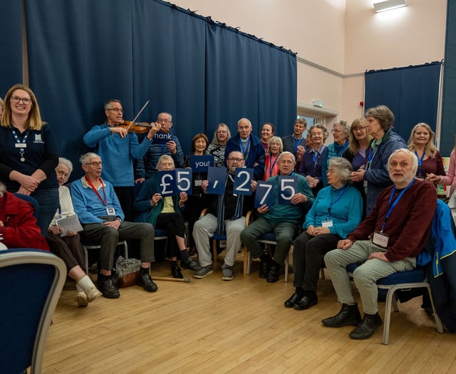 Cheque out firm's £5.2k support for Dementia Friendly Alton