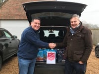 Councillor helps hand out festive hampers to families