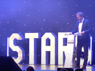VIDEO: Farnham Men's Pit Stop organiser wins prestigious Surrey award