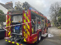Fire at Farnham house closes major road