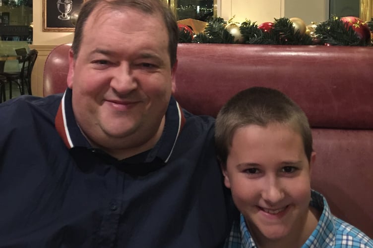 Phil Morris with son Orson. Photo released February 5 2024. See SWNS story  SWCCsleave. A grief-stricken widow has slammed a private healthcare firm which she says made a catalogue of errors in the leadup to her husbands tragic death.  In December 2021, lecturer and writer Phil Morris, 48, was admitted into St Anthonys Hospital in Surrey  owned by private healthcare provider Spire  for a planned gastric sleeve operation.  This was supposed to be life changing for the dad-of-one, who had Type 2 diabetes and had always struggled with his weight.  However, just days after the £14,000 surgery, Phil died from a lack of oxygen  which his wife Dana and son Orson blame on the appalling care they say he received from those at Spire.