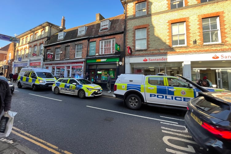 Police outside Santander on the Borough in Farnham