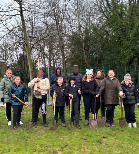 Eggar's School pupils plant elm trees, Anstey Park, Alton, February 2025.