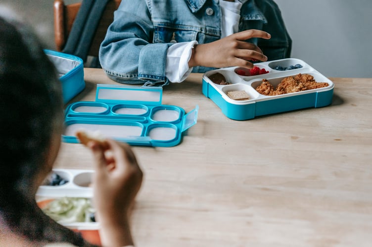 Children eating food stock image