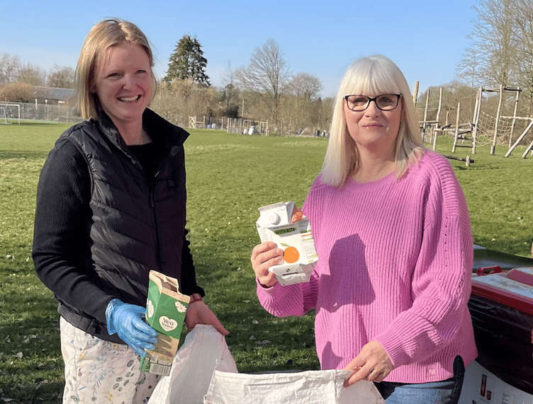 Karen Hawtin and Emily with Tetra Pak cartons, Selborne, March 2025.