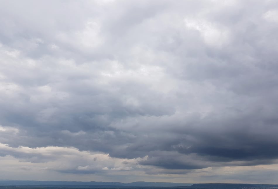Patchy rain and partly cloudy skies