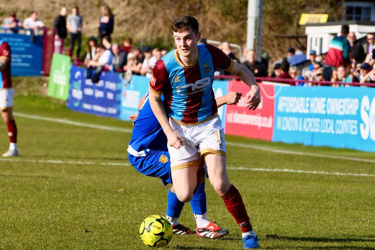 Farnham Town's Joe Jackson in action against Uxbridge