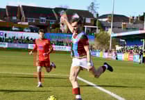 Champions Town slip to home defeat
