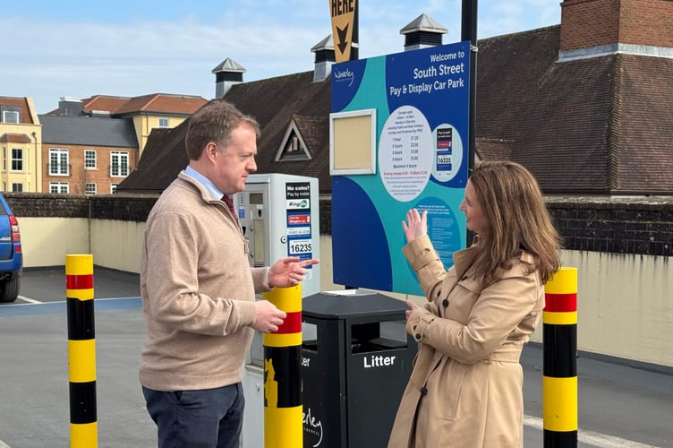 Waverley Conservative group leader Jane Austin discusses the parking costs in Farnham with Greg Stafford MP.