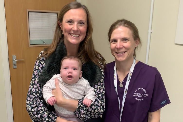 Harriet Paget with hospital staff at St George's Hospital Charity in London.