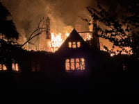 WATCH: Historic house severely damaged in late-night blaze