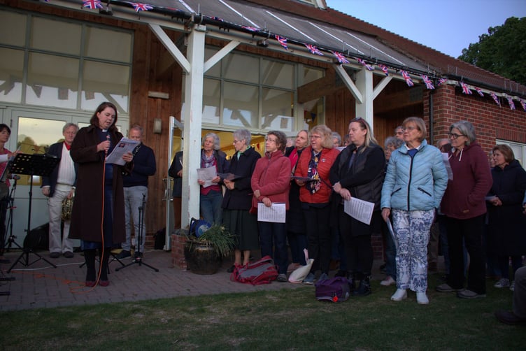Revd Amber Beresford leads the VE Day 80 event at Ropley recreation ground, May 8th 2025.