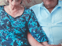 Diamond anniversary of boy and girl from opposite sides of road