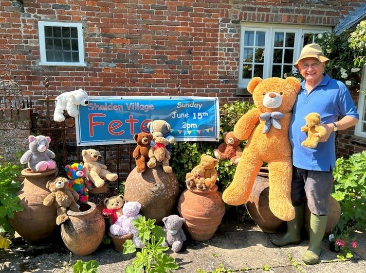 Ian Champness with some of the prizes to be won on the Shalden Fete teddy bear coconut shy, June 2025.