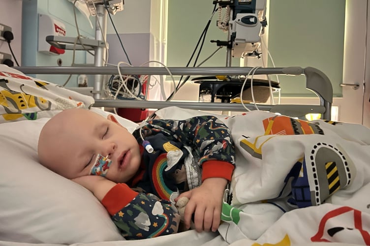 Felix Disney-Moore pictured during treatment for trilateral retinoblastom Ð he had to undergo eight months of chemotherapy. The parents of a little boy diagnosed with two rare cancers before the age of three were "relieved" to discovered he had blood cancer instead of the disease in his eye spreading - because it gave him "a chance of survival". Felix Disney-Moore, four, had no symptoms until his mum, Hayley Disney, 40, spotted a white glow left eye and took him for a check-up at Frimley Park Hospital, Surrey.  He was urgently referred to Royal London Hospital and diagnosed with bilateral retinoblastoma - a form of eye cancer that affects both eyes - and the family were told he'd need his left eye removed to save his life.