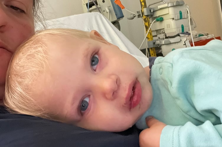 Felix Disney-Moore with mum Hayley in hospital. The parents of a little boy diagnosed with two rare cancers before the age of three were "relieved" to discovered he had blood cancer instead of the disease in his eye spreading - because it gave him "a chance of survival". Felix Disney-Moore, four, had no symptoms until his mum, Hayley Disney, 40, spotted a white glow left eye and took him for a check-up at Frimley Park Hospital, Surrey.  He was urgently referred to Royal London Hospital and diagnosed with bilateral retinoblastoma - a form of eye cancer that affects both eyes - and the family were told he'd need his left eye removed to save his life.