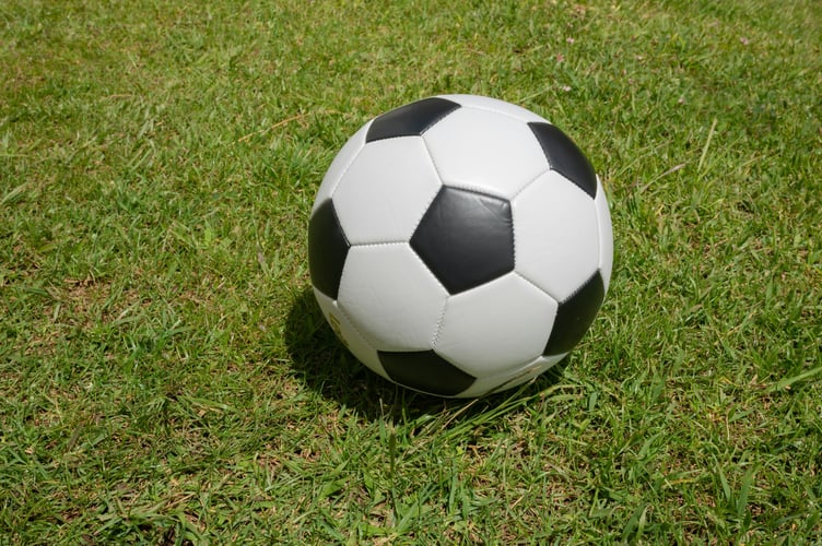 Football on grass.