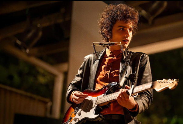 Timothée Chalamet as Bob Dylan in A Complete Unknown.
