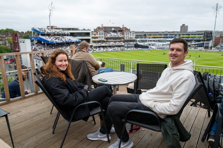 Olga Tyurina and friend Ollie Carter. At Oval Mansions, whoâs residents have access to the balcony overlooking The Oval cricket ground, London, 3rd June 2025 . A flat overlooking The Oval which boasts some of the finest views in English cricket is up for sale for £400,000.The plush properties at Oval Mansions in south London - some of which sell for nearly £1m - are the most coveted in the sporting world due to the building's stunning roof terrace.Tenants are able to invite friends up to watch matches, though limitations are sometimes enforced for the highest-profile games. During the Ashes series between England and Australia, spots on the terrace are so highly sought after that plus ones are limited to just one per flat, with management regularly having to eject those who manage to sneak in.