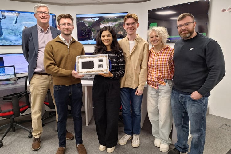 Representatives from Surrey NanoSystems and the University of Surrey.   From left to right: Professor Keith Ryden, James Whitfield, Astha Astha, Dr Keiran Clifford, Dr Noelia Noël and Luca Ferrian.        British researchers are working to solve the problem of Elon Musk's reflective satellites - by painting them black. A new partnership between Surrey NanoSystems and the University of Surrey is aiming to tackle the growing problem, a major concern for astronomers worldwide. Their latest innovation, Vantablack 310, is a super-black coating designed to dramatically reduce the glare from satellites that interferes with astronomical observations. Only 2% of incoming light is reflected by the surface after product is applied, while the remaining 98% is absorbed. More than 8,000 low Earth orbit (LEO) satellites already orbit Earth and projections estimate a rise to 60,000 by 2030, partly driven by the development of mega-constellations.
