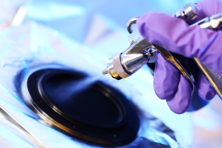 Image shows Vantablack being applied to a surface.        British researchers are working to solve the problem of Elon Musk's reflective satellites - by painting them black. A new partnership between Surrey NanoSystems and the University of Surrey is aiming to tackle the growing problem, a major concern for astronomers worldwide. Their latest innovation, Vantablack 310, is a super-black coating designed to dramatically reduce the glare from satellites that interferes with astronomical observations. Only 2% of incoming light is reflected by the surface after product is applied, while the remaining 98% is absorbed. More than 8,000 low Earth orbit (LEO) satellites already orbit Earth and projections estimate a rise to 60,000 by 2030, partly driven by the development of mega-constellations.