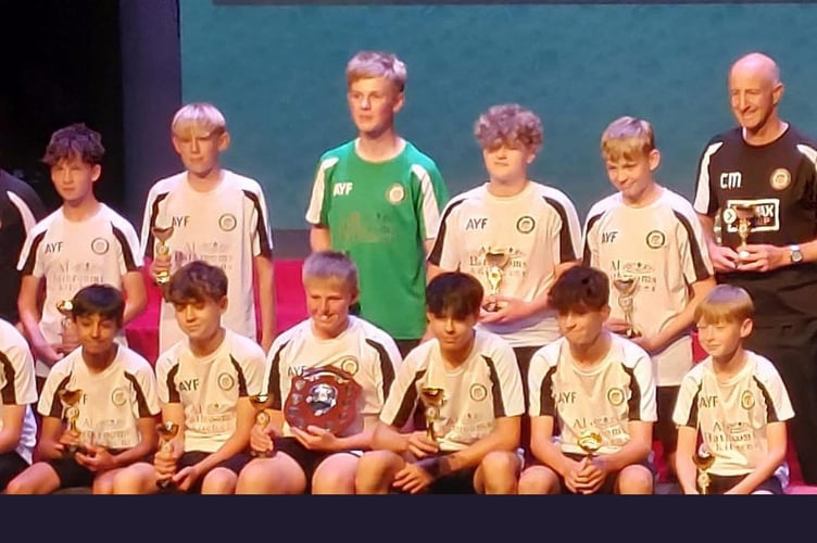 Alton Fireballs under-13s show off their trophies and the championship shield at the North East Hants Youth League awards night, June 19th 2025.