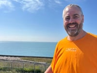 Kevin completes epic cross-Channel swim for hospice care