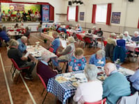 Ukulele band leads party as Four Marks Care celebrates 50th birthday