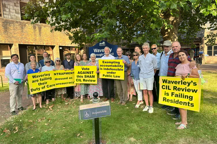 Residents impacted by CIL protest outside Waverley Borough Council's headquarters.
