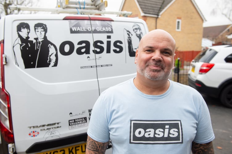 Oasis superfan John Smallbones with his van with his van plastered in stickers dedicated to the Oasis. See SWNS story SWOCoasis; Meet the Oasis superfan who has spent THOUSANDS on band memoribillia including life size cut outs of the Gallagher brothers - and his fiancee isn't even a fan. John Smallbones, 45, fell in love with the band back in 1992 and was devastated when the brothers went their separate ways. Over the past decade, window surveyor John has spent thousands of pounds on Oasis merchandise including vinyls, clothing and life size cutouts of both Gallagher brothers. He's even got Oasis tattoos and has named his business 'Wall of Glass' after the popular 2017 Liam Gallagher hit with a van plastered in stickers dedicated to the boys. His home is covered top to bottom with Oasis memorabilia, much to the amusement of his extremely patient fiancee Elaine, 46, who isn't even a fan of the band.