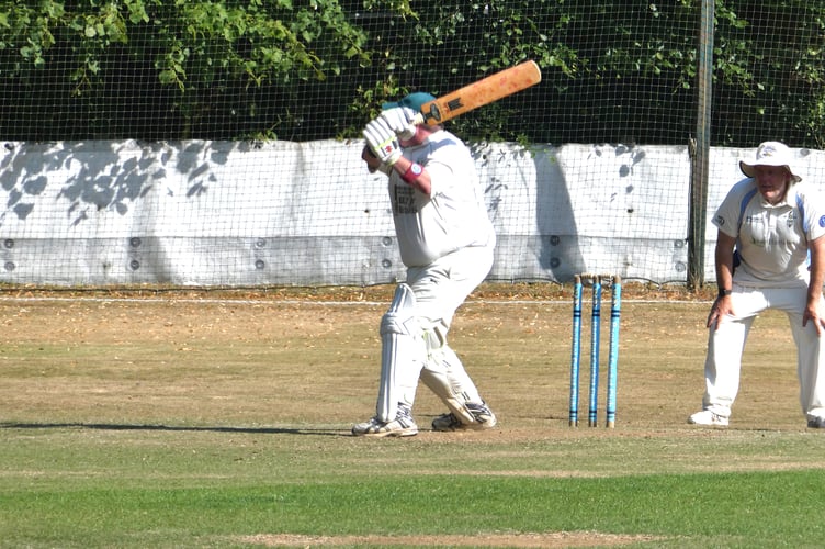 Simon Brewer cracks one of his seven fours