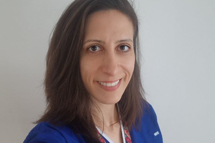 Alicia Arias in her hospital uniform.