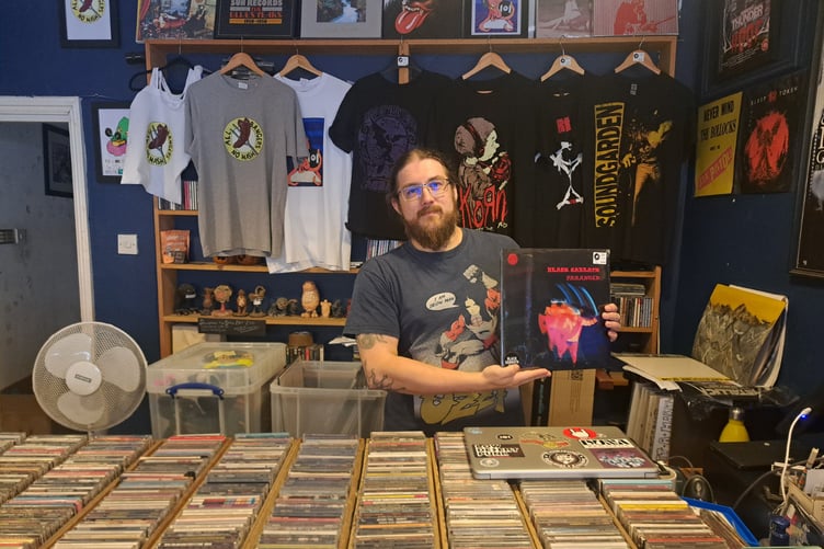 Kenny Record with Black Sabbath Vinyl