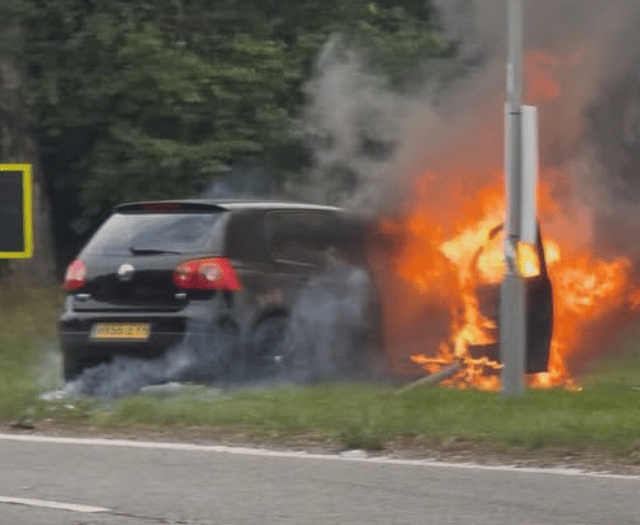 A31 shut as firefighters deal with car blaze