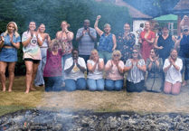 The heat is on as Right at Home fire walkers raise £2.5k for charity