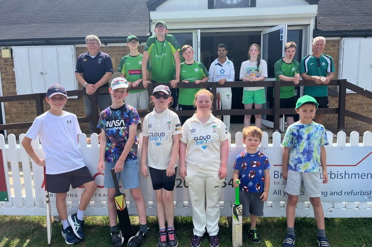 Players from Rowledge and Valley End at the disability cricket festival