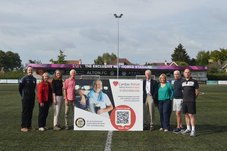 Cardiac Rehab trustees, chief executive Sarah Quarterman and general manager Denise Ellis are pictured with Alton FC chairman Carl Saunders and other club members at the unveiling of the charity’s new fundraising banner, Alton FC, August 22nd 2025.