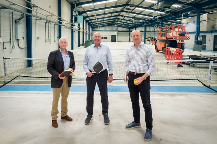 Cllr Mark Merryweather, Chief Executive of Rainier Developments Richard Mees, and Chair of Hurlands Philip Newborough at the site of Farnham's new padel and pickleball courts.