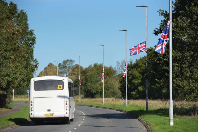 Flags on lampposts can stay unless they are causing an obstruction