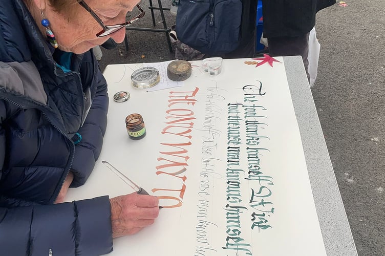 Calligrapher Mary Noble at the launch of Farnham Craft Month.