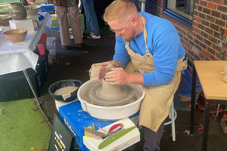 Throwing some pots at the launch of Farnham Craft Month.