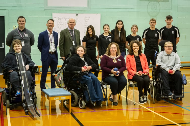 Alton town mayor Cllr Annette Eyre (front row, third from left) and East Hampshire district councillor Emily Young (front row, second from right) play students on the new boccia courts at Alton College, October 20th 2025.