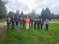 Pupils from Amery Hill School help historian clean Alton's war graves