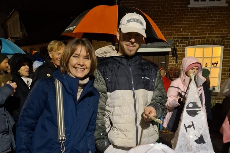 Gemma Ball, head of Badshot Lea Village Infant School, with a lantern celebrating 130 years of the school