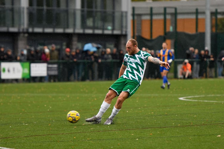 Adam Liddle fires home Farnham Town's equaliser