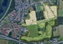 Developer unveils Hogs Back plans for hundreds of new homes